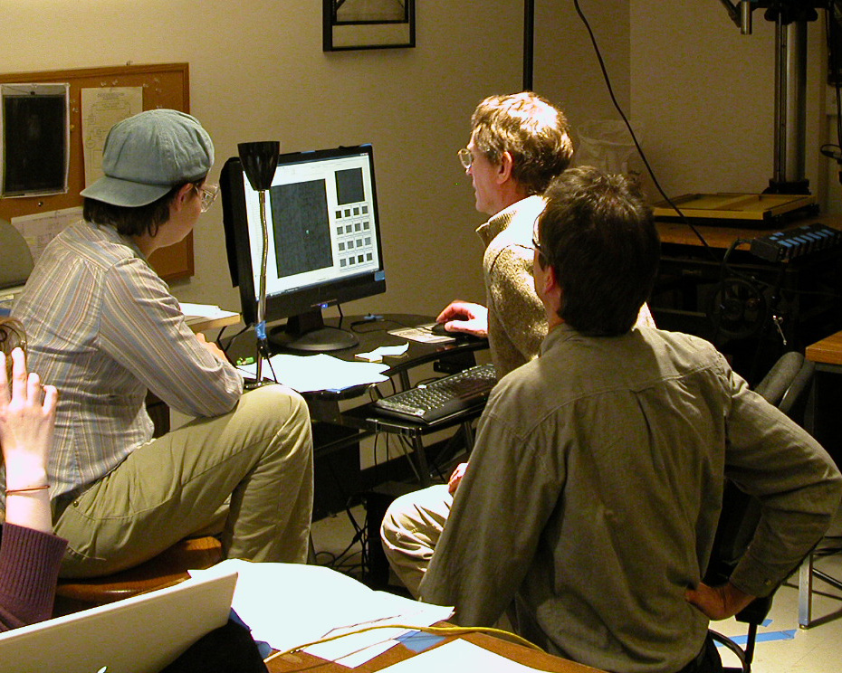 Imaging specialist Janet Safford (left), imaging scientist Bill Christens-Barry (at computer), and program manager Mike Toth (foreground) review the captured images. Copyright Adrian S. Wisnicki. Creative Commons Attribution-NonCommercial 3.0 Unported (https://creativecommons.org/licenses/by-nc/3.0/).