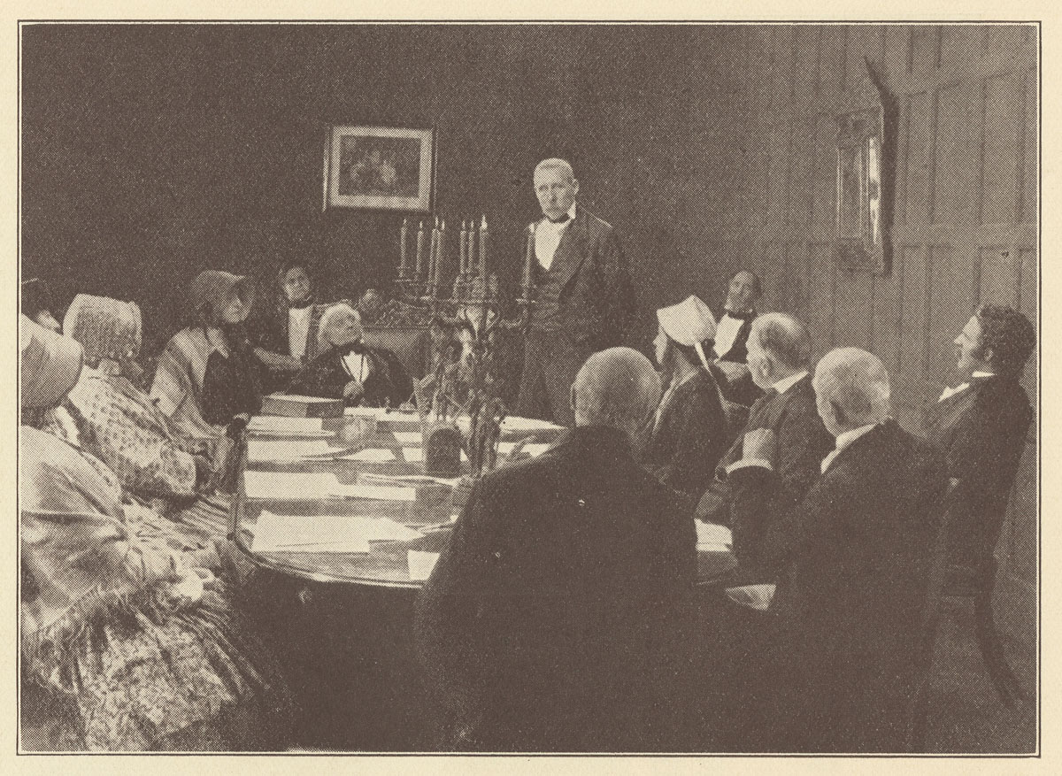 'Livingstone hears Robert Moffat address the London Missionary Society—and responds to The Call!' Photograph from promotional booklet for Livingstone: A Drama of Reality (Film), 1925. Copyright National Library of Scotland. Creative Commons Share-alike 2.5 UK: Scotland (https://creativecommons.org/licenses/by-nc-sa/2.5/scotland/).