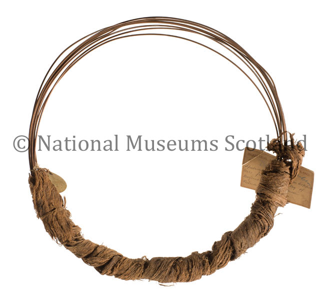 Length of copper wire wrapped in barkcloth, collected by David Livingstone, mid-nineteenth century. Image copyright National Museums Scotland. Used by permission. Any form of reproduction, transmission, performance, display, rental, lending, or storage in any retrieval system without the written consent of the copyright holders is prohibited. Downloading the images for use by third parties and end users is strictly prohibited, except for private study. Downloading of images for commercial purposes will be treated as a serious breach of copyright and strong legal action will be taken by National Museums Scotland.