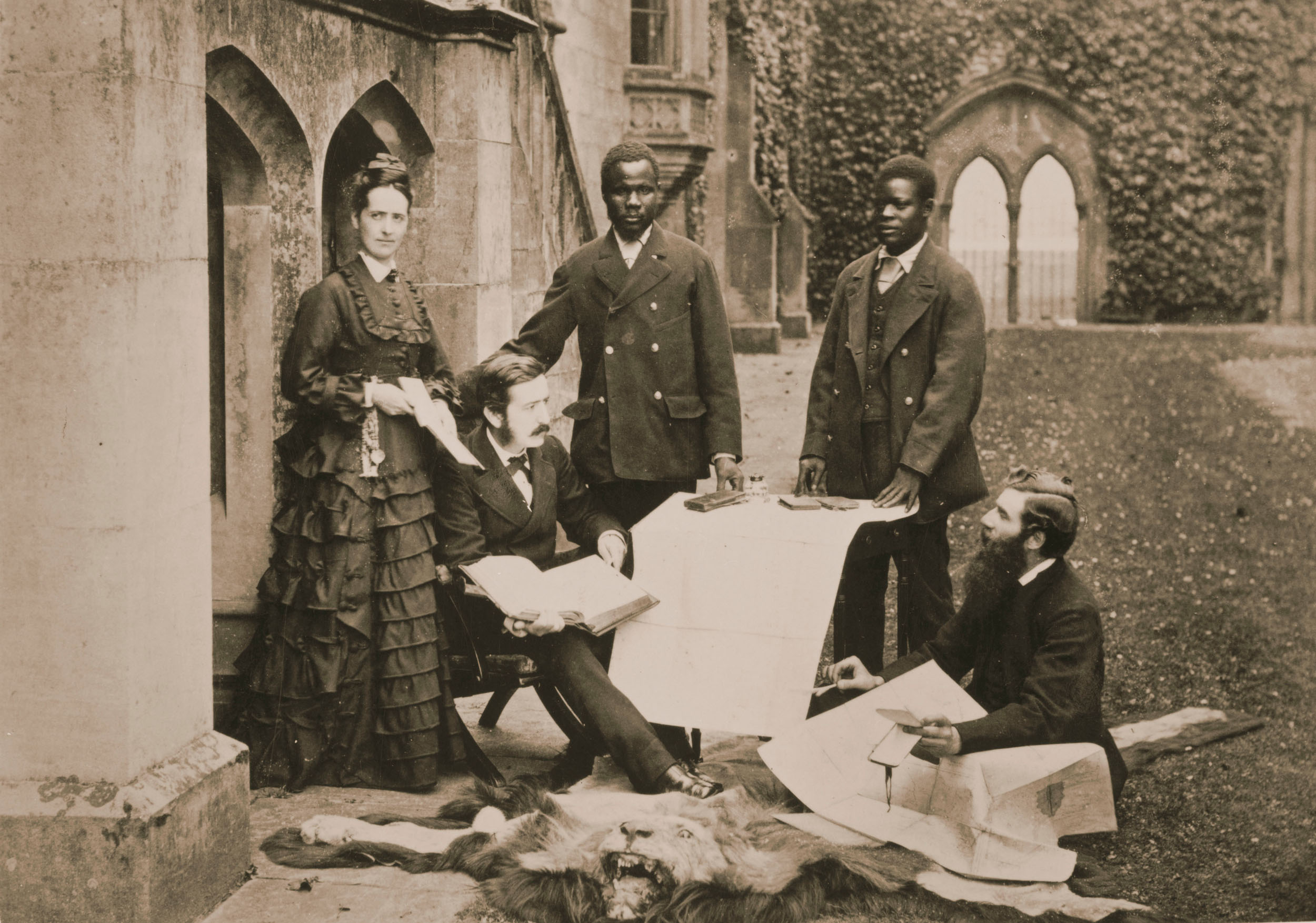 Agnes and Thomas Livingstone, Daughter and Son of David Livingstone, Abdullah Susi, James Chuma, and Rev. Horace Waller at Newstead Abbey, Nottingham, Discussing the Journals, Maps, and Plans Made by the Late David Livingstone, 1874. SOAS Library, University of London. Copyright Council for World Mission. Used by permission for private study, educational or research purposes only.