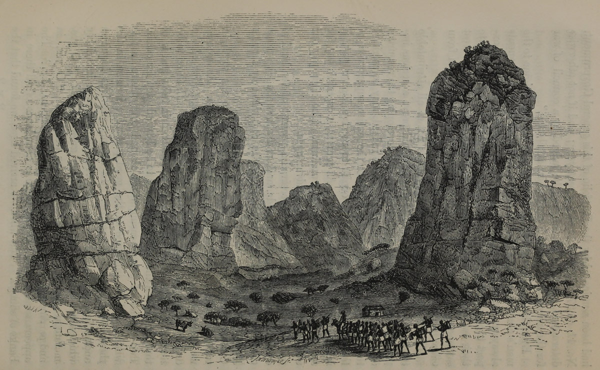 A few of the Rocks of Pungo Andongo, as seen from Col. Pires' House at Cahuey, with the Makololo Party Passing. Illustration from Missionary Travels (Livingstone 1857aa:opposite 420). Courtesy of the Internet Archive (https://archive.org/details/missionarytravel03livi/).