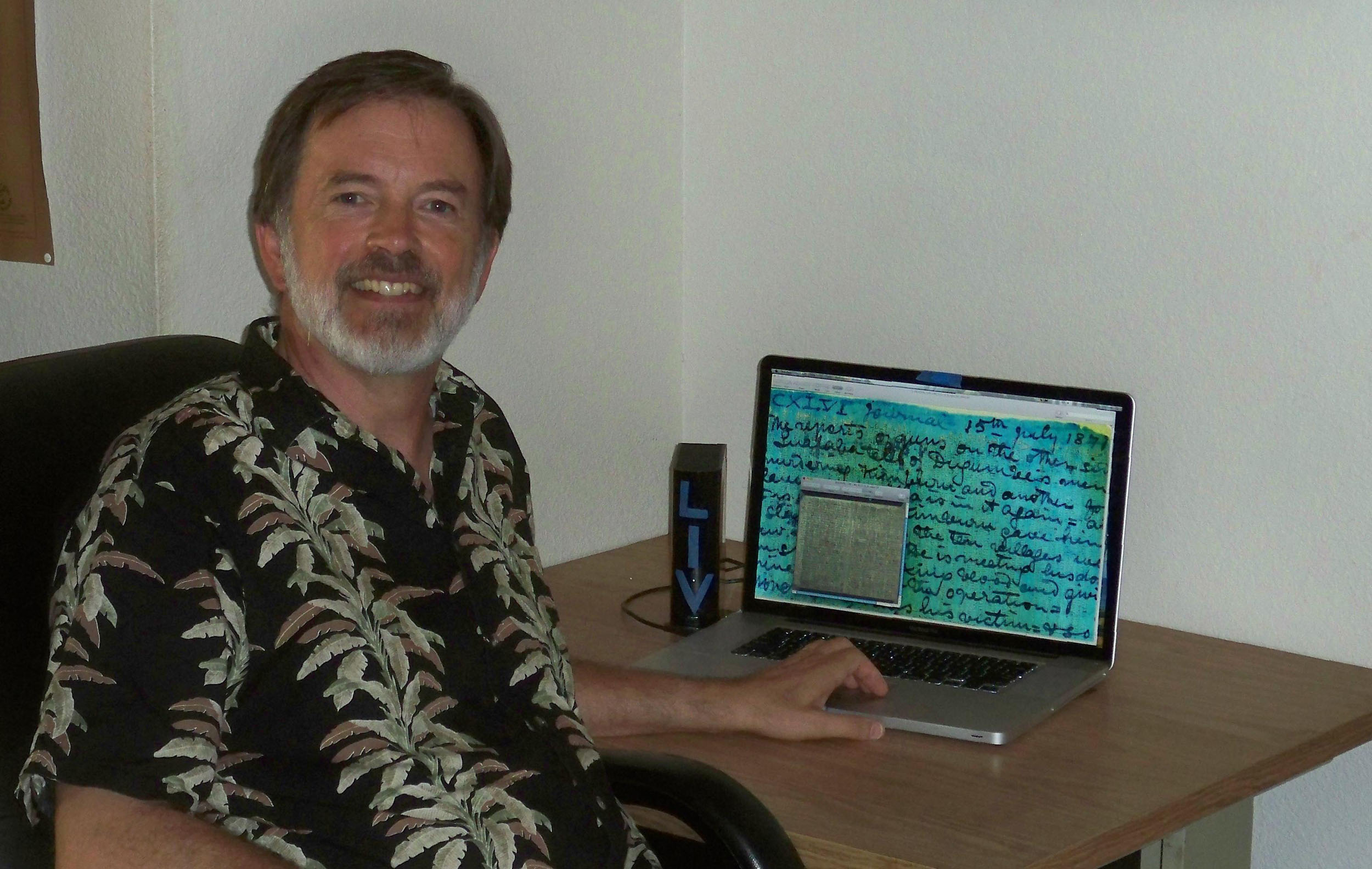 Keith Knox after a breakthrough in processing the spectral images the 1871 Field Diary in Maui, Hawaii, 2010. Copyright Livingstone Spectral Imaging Project team. Creative Commons Attribution-NonCommercial 3.0 Unported (https://creativecommons.org/licenses/by-nc/3.0/).