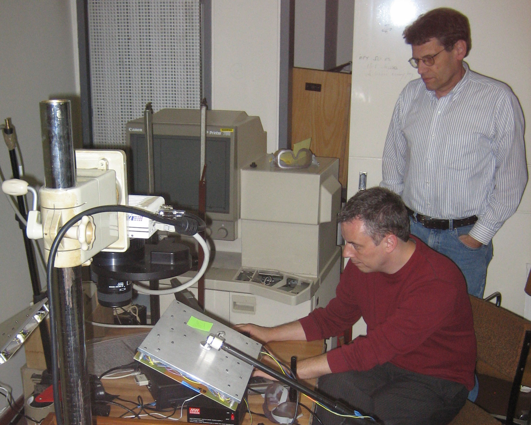 Doug Emery and Roger L. Easton, Jr. review spectral image data of the 1871 Field Diary, 2010-2011. Copyright Livingstone Spectral Imaging Project team. Creative Commons Attribution-NonCommercial 3.0 Unported (https://creativecommons.org/licenses/by-nc/3.0/).