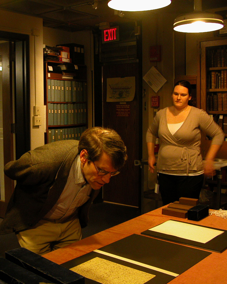 Imaging scientist Roger L. Easton, Jr. examines the Letter from Bambarre while an unidentified conservator from the Walters Art Museum looks on. Copyright Adrian S. Wisnicki. Creative Commons Attribution-NonCommercial 3.0 Unported (https://creativecommons.org/licenses/by-nc/3.0/).